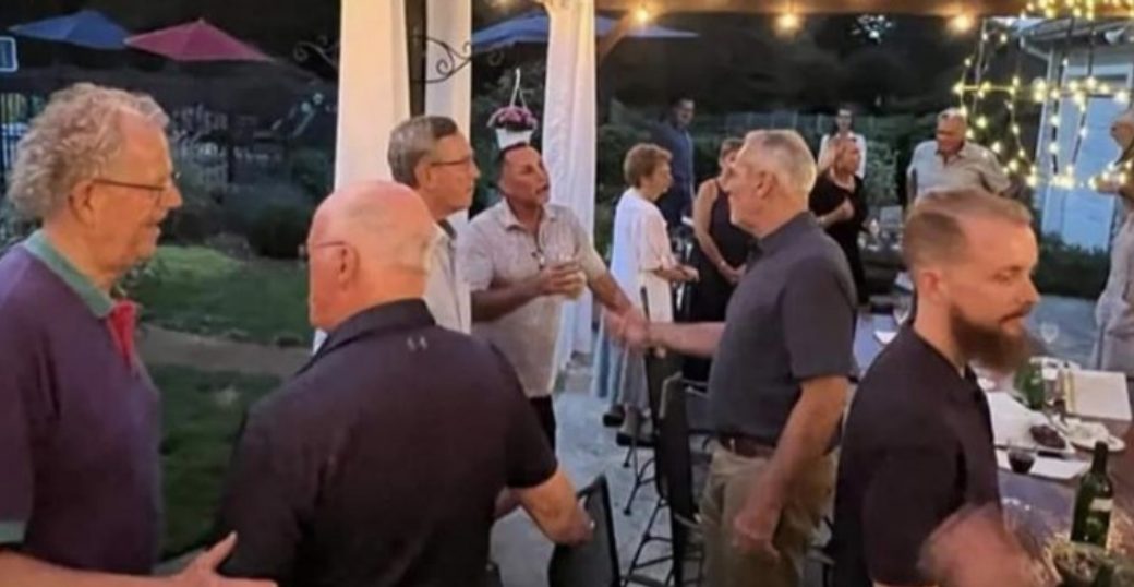 ICA of Indiana members talking at an outdoor evening gathering